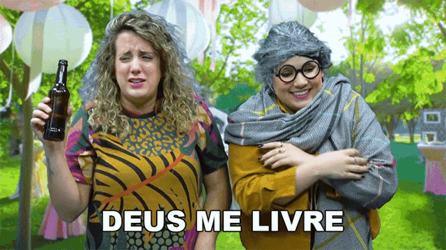 two women standing next to each other with deus me livre written on the bottom right