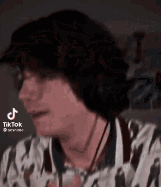 a close up of a person 's face with a tiktok watermark on it