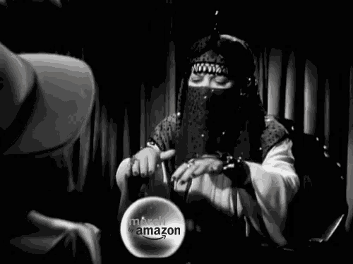 a black and white photo of a woman holding a crystal ball with the words march amazon on the bottom
