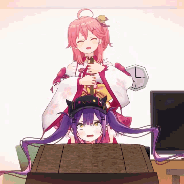 a girl with purple hair is sitting on another girl 's head