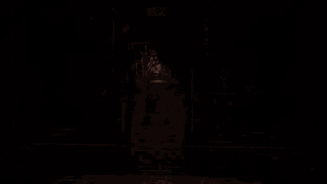 a dark room with a checkered floor and a table in the center