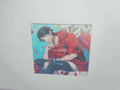 a picture of a man in a red shirt holding a gift box