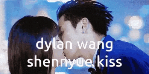 a man and a woman are kissing with the words dylan wang shennyue kiss written above them .