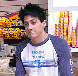 a man wearing a shirt that says dopo yume on it