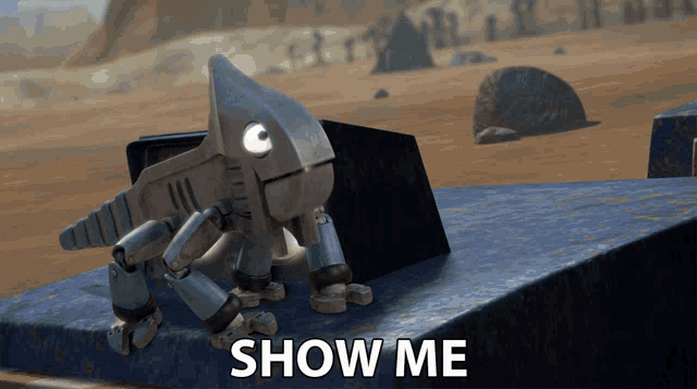 a robot is sitting on a ledge with the words show me behind it