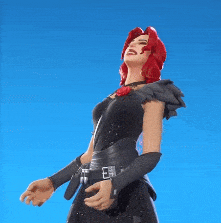 a woman in a black dress with red hair is laughing .