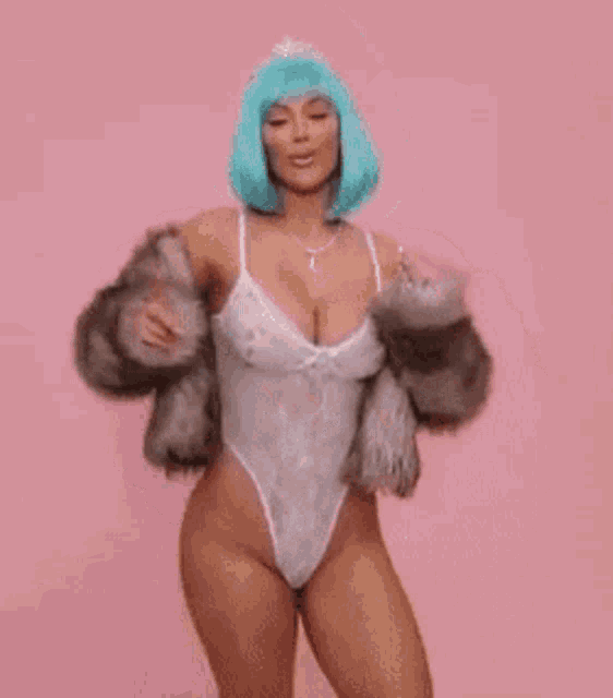 a woman is wearing a fur coat and a white bodysuit .
