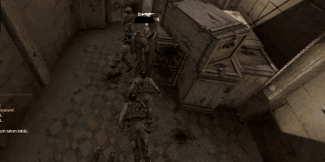 a screenshot of a video game shows soldiers fighting in a room with a few messages on the bottom