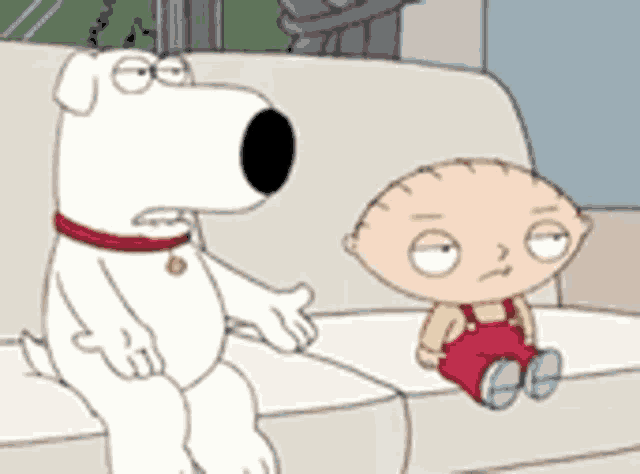 a cartoon dog is sitting on a couch next to a baby sitting on a couch .