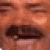 a close up of a man 's face with a mustache and closed eyes .