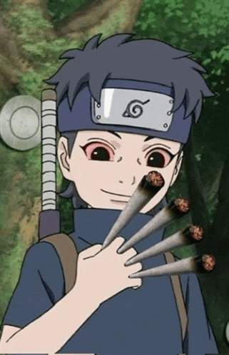 a boy with a headband with the letter g on it is holding a bunch of joints