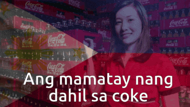a woman stands in front of a display of coca-cola bottles