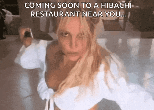 a woman is standing in front of a sign that says ' coming soon to a hibachi restaurant near you ... '