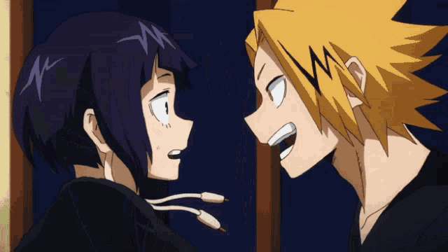 two anime characters are looking at each other and one has a w on his head