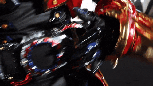 a close up of a person wearing a red , white and blue belt