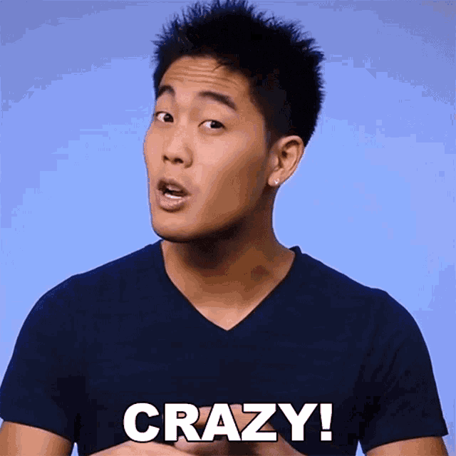 a man in a black shirt has the word crazy written on his chest