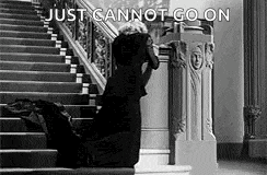 a black and white photo of a woman kneeling down on a set of stairs with the caption `` just cannot go on '' .