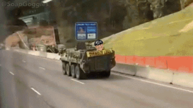 a cartoon soldier is driving a tank down a highway with a sign that says ' soapgoggles ' on it