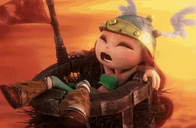a cartoon character wearing a helmet is sitting in a cage with her mouth open .