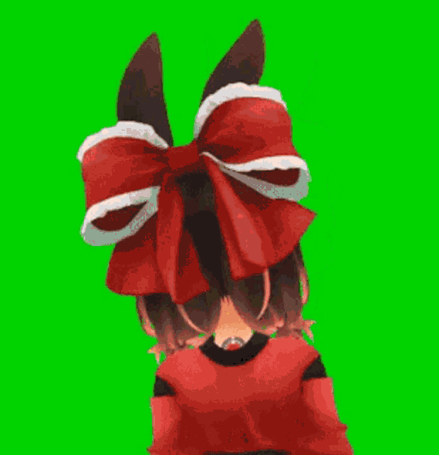 a girl with bunny ears is wearing glasses and a red bow on her head .