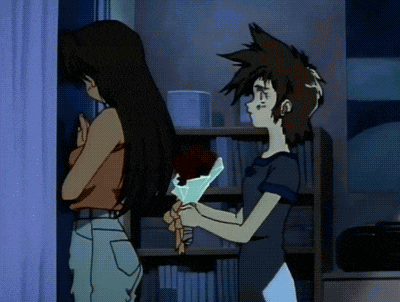a girl is holding a bouquet of flowers in front of a boy