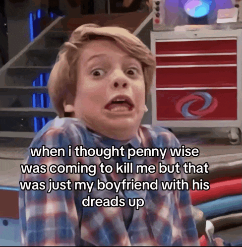 a young boy is making a funny face while talking about penny wise coming to kill him
