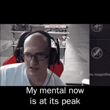 a bald man wearing glasses and headphones with the words " my mental now is at its peak "