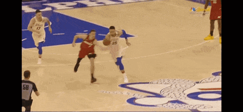 a basketball player with the number 25 on his jersey is dribbling a basketball on a court .