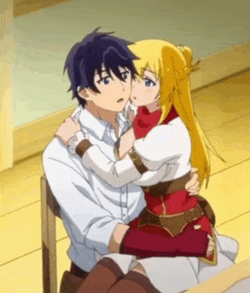a man and a woman are hugging each other in a chair .