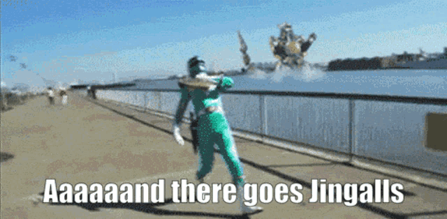 a green power ranger is running on a bridge with the words " aaaaaand there goes jingalls " above him