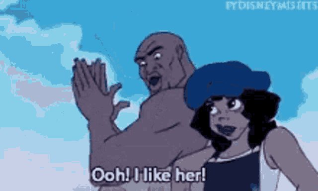 a man and a woman are standing next to each other and the woman is saying ooh i like her .