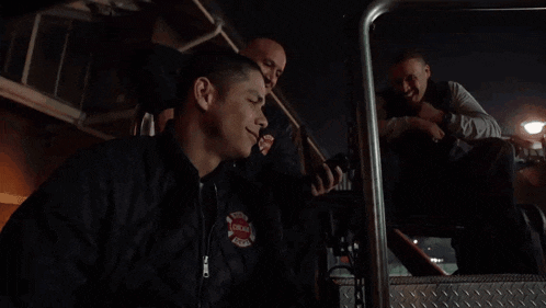 a man wearing a jacket that says chicago fire department