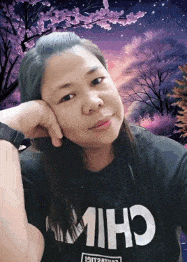 a woman wearing a black shirt that says chilk on it