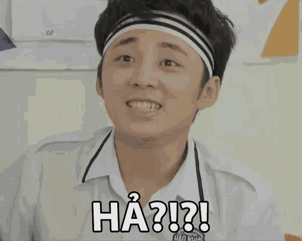 a young man with a headband on his head says ha ? !!