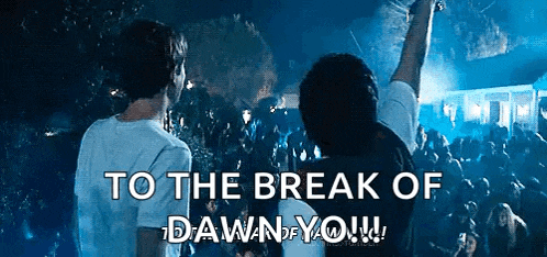 two men are standing in front of a crowd at a concert and the words `` to the break of dawn of you ! ''