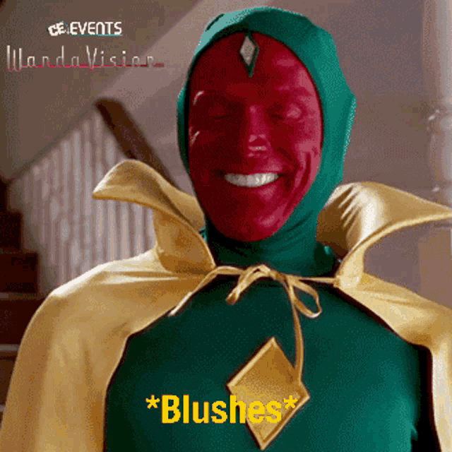 a man in a superhero costume with the word blushes on his chest