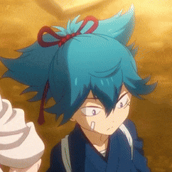 a close up of a person with blue hair