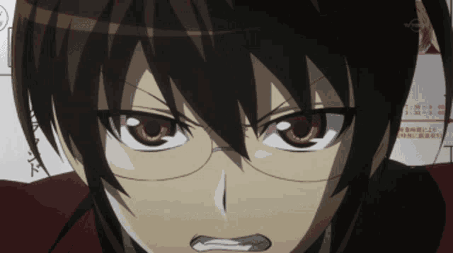 a close up of a person 's face with a foreign language on the bottom right