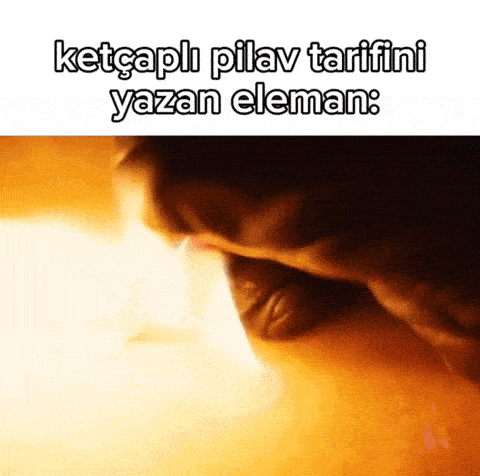 a close up of a person 's face with the words `` ketcapli pilav tarifini yazan eleman '' written on it .