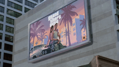 a billboard advertises grand theft auto vi on the side of a building