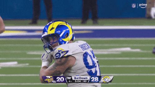 a football player wearing a helmet with the number 97 on it