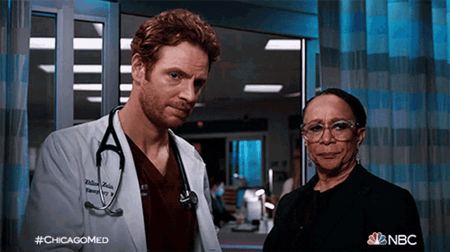 a man with a stethoscope around his neck is standing next to a woman in a hospital room with the hashtag #chicagomed