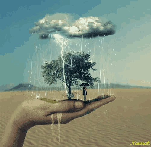 a hand is holding a tree and a cloud with rain coming out of it