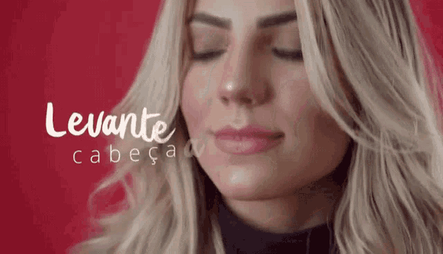a close up of a woman 's face with the words levante cabeca written on the bottom