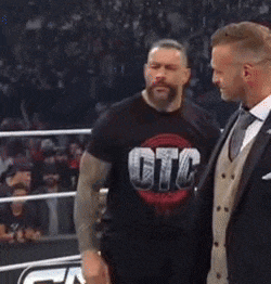 Roman Reigns Hand Out GIF