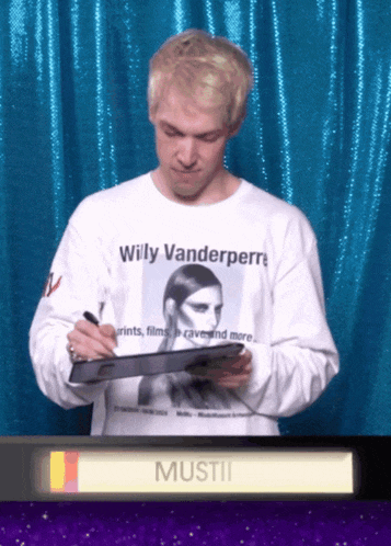 a man wearing a white shirt that says willy vanderperre