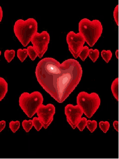 a glowing red heart is surrounded by smaller hearts