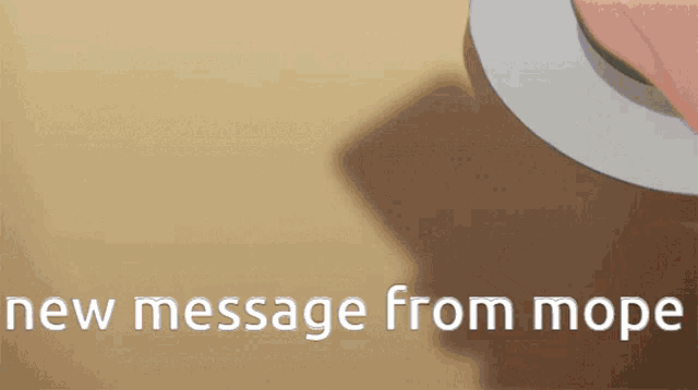 a person holding a cell phone with a new message from mope written on it
