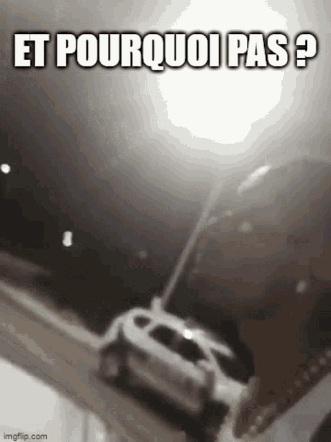 a police car is parked on the side of the road in the dark .