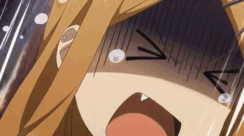 a close up of a person 's face with a surprised expression